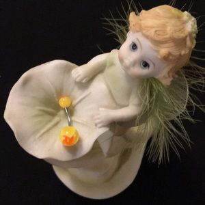 NWOT yellow an orange belly ring.